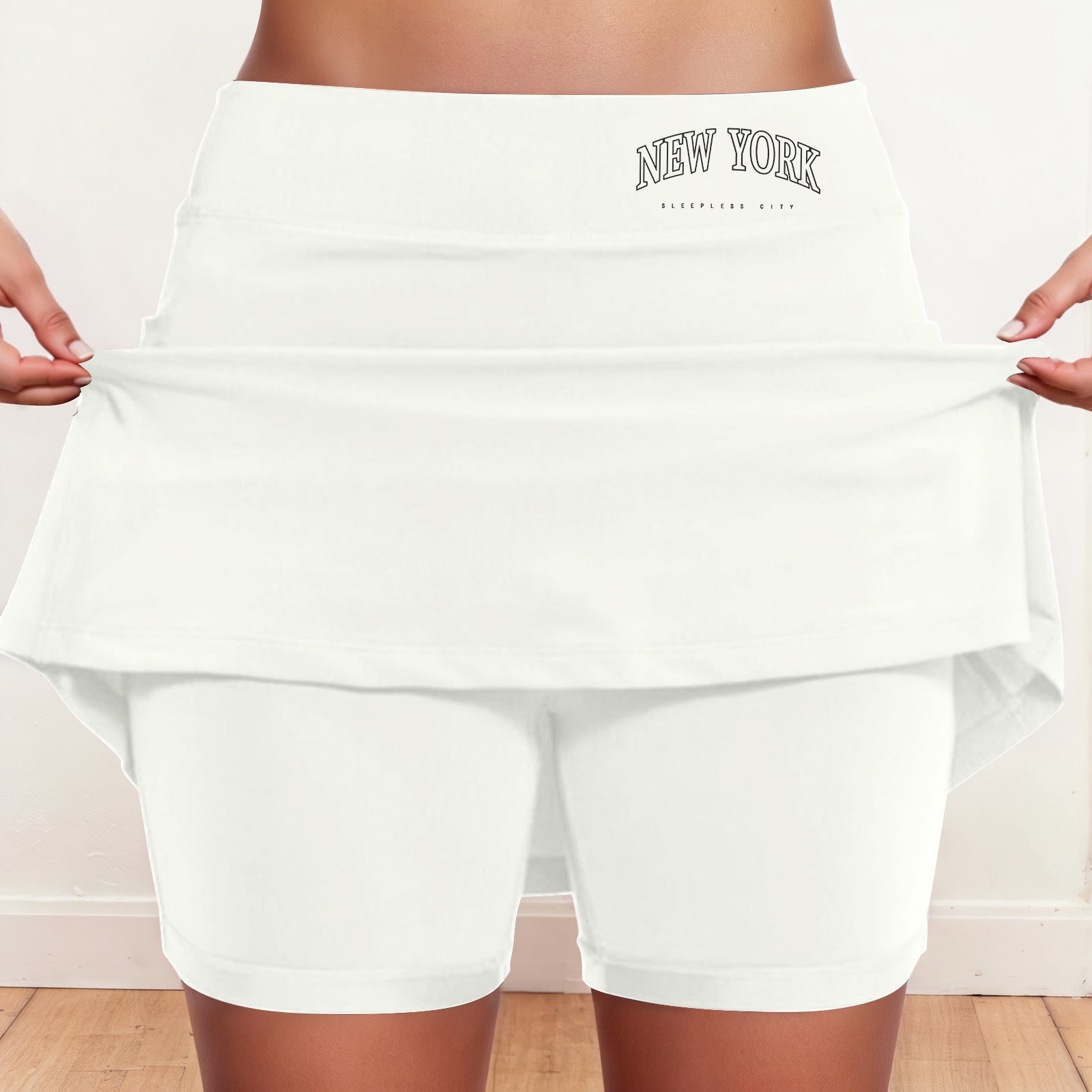 thumbnail image 2 of Falda culotte de talle medio para mujer: cintura elástica, bolsillos laterales, diseño fluido en capas, falda estampada informal para el verano., 2 of 5